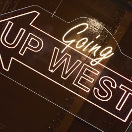 Sign saying Going up West