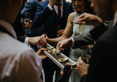Guests at a drinks and canapé reception in the High-level Walkways
